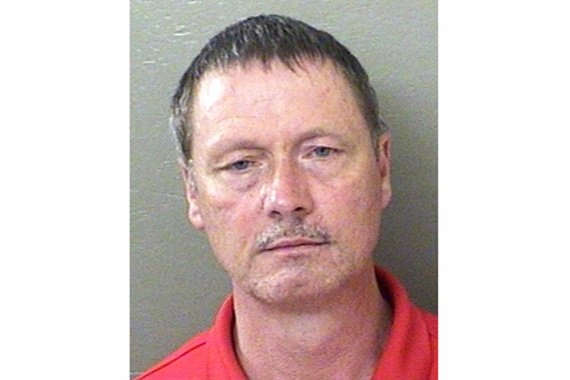 Former football coach charged with 40 counts